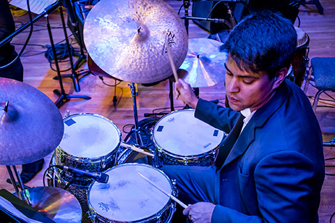 Drummer performing on stage