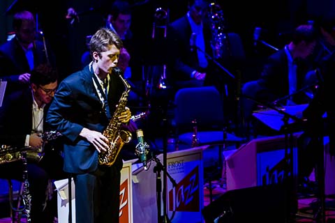 Man plays a saxophone during a Jazz performance at the University of Miami